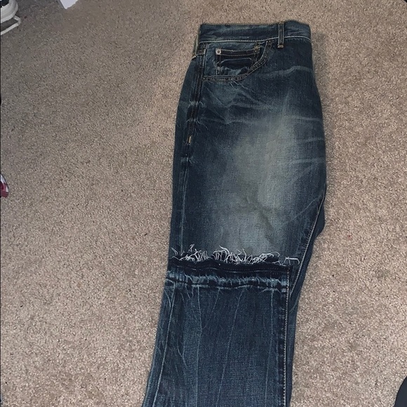 mens jeans ripped at bottom